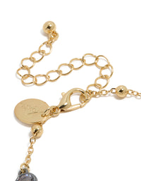 Mixed metal bracelet with gold plated lobster clasp, adjustable extender chain, ball accents, and cubic zirconia stones closure detail view - link has visual effect only