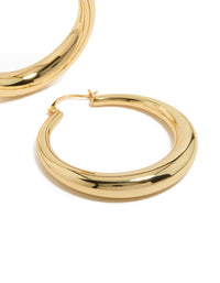 Presenting gold plated thick thin hoop earrings highlighting closure mechanism post detail view - link has visual effect only