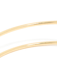 Crafted from gold plated material, this diamante wrap around arm cuff features statement styling detail view - link has visual effect only