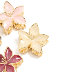 Designed with gold pink burgundy enamel frangipani claw clips in a 4-pack showcasing floral design and glitter accents side view - link has visual effect only