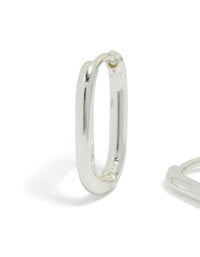 Beautifully crafted waterproof silver plated stainless steel rectangle huggie earrings featuring huggie closure in silver close up view - link has visual effect only