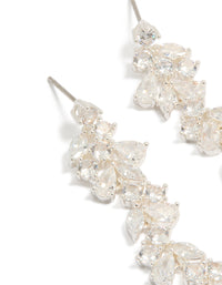 Elegant dainty drop earrings, crafted from silver plated material featuring cubic zirconia in clear close up view - link has visual effect only