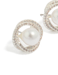 Beautifully crafted twist pearl stud earrings with cubic zirconia and silver plated detailing close up view - link has visual effect only