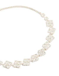 Showcasing a cubic zirconia flower detail toggle bracelet in silver plated finish close up view - link has visual effect only