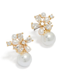 Showcasing gold plated cubic zirconia flower pearl drop stud earrings in white and ivory front view - link has visual effect only