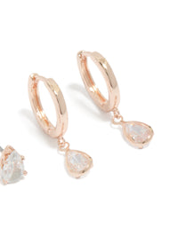 Crafted from gold-plated material, these 2-pack huggie earrings feature teardrop charm with cubic zirconia post detail view - link has visual effect only