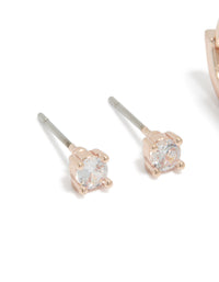 Crafted from rose gold plated cubic zirconia studs with dainty floral and crystal accents in 2-pack close up view - link has visual effect only