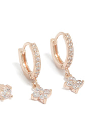 Crafted from rose gold plated cubic zirconia studs with dainty floral and crystal accents in 2-pack close up view - link has visual effect only