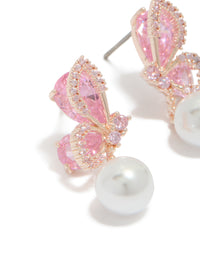 Stunning rose gold plated cubic zirconia butterfly pearl drop earrings close up view - link has visual effect only