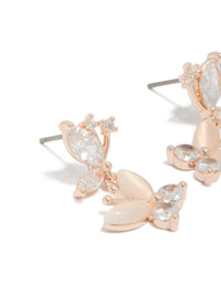 Elegant drop earrings with double butterfly charm featuring cubic zirconia in rose gold plated finish close up view - link has visual effect only