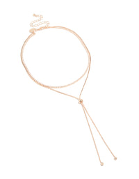 Presenting a rose gold plated cubic zirconia cup chain and snake layered Y-necklace with crystal accents front view - link has visual effect only