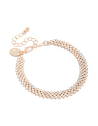 Featuring a rose gold plated cubic zirconia diagonal tennis bracelet with round stone cut front view - link has visual effect only