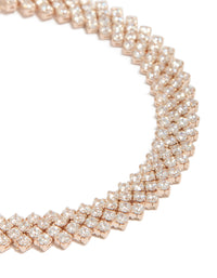 Crafted from rose gold plated cubic zirconia diagonal tennis bracelet with round stone cut close up view - link has visual effect only