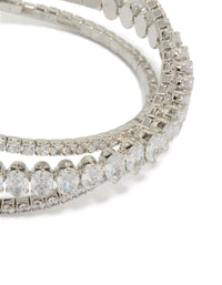 Elegant statement crossover wrist cuff crafted from cubic zirconia in silver close up view - link has visual effect only