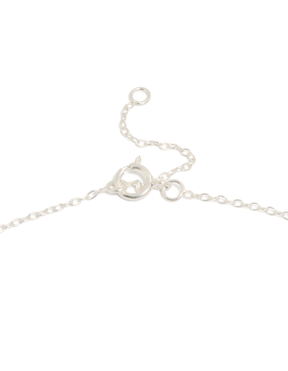 Showcasing a heart and key pendant necklace with charm details in sterling silver featuring toggle closure clasp detail view