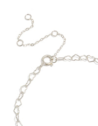 Designed with sterling silver heart links, this bracelet displays a closure detail view - link has visual effect only