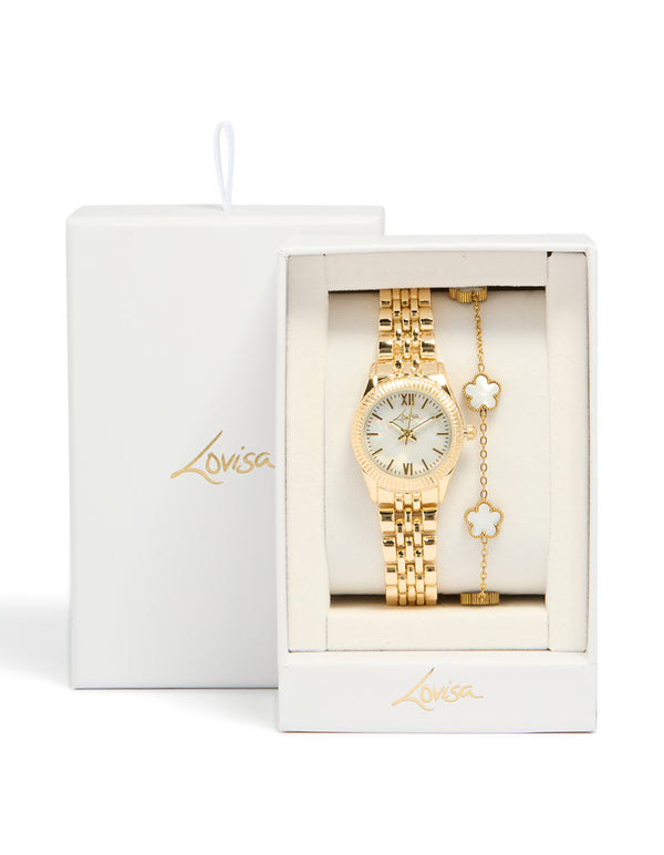 Showcasing a women's analog watch and bracelet set with floral design, white dial featuring roman numerals, round dial shape, formal occasion styling, link band strap in gold case detail view