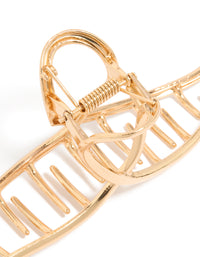 Crafted with a gold wavy claw clip detail view - link has visual effect only