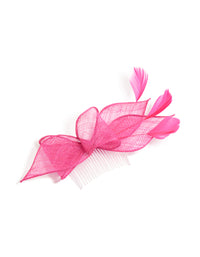 Showcasing a statement fascinator hair comb with feathers and floral petal in hot pink and white front view - link has visual effect only