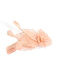 Showcasing a peach pink flower and feather fascinator comb with floral design in solid print front view - link has visual effect only