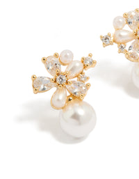Elegant gold plated cubic zirconia laurel and pearl flower hoop earrings featuring floral design in ivory close up view - link has visual effect only