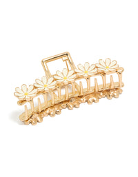 Showcasing a white enamel daisies floral claw clip in gold front view - link has visual effect only