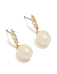 Showcasing statement gold plated cubic zirconia and freshwater pearl drop earrings front view - link has visual effect only