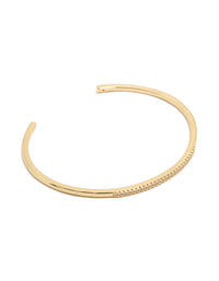 Showcasing a gold plated cubic zirconia thin wrist cuff bangle front view - link has visual effect only