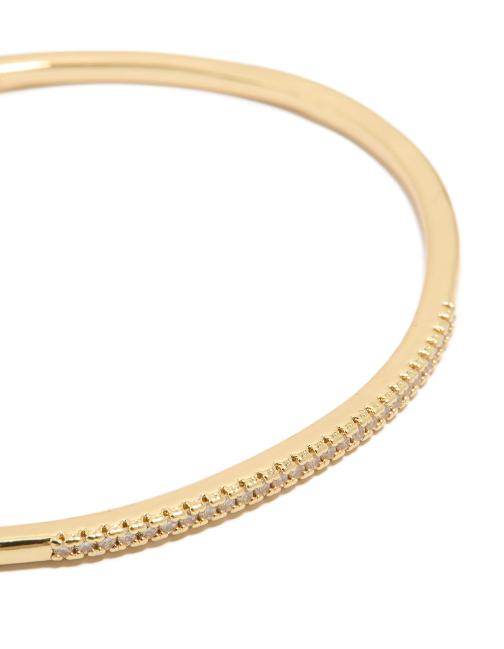 Gold plated thin wrist cuff bangle bracelet with cubic zirconia stones close up view
