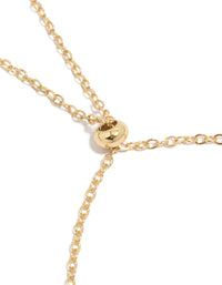 Featuring a gold plated clear and cognac cubic zirconia square cut bezel toggle bracelet closure detail view - link has visual effect only