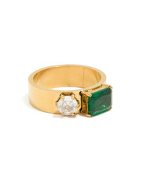 Showcasing a waterproof gold plated stainless steel thick band ring featuring clear and green cubic zirconia in a statement style front view - link has visual effect only