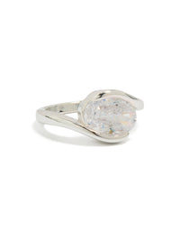 Showcasing a silver plated cubic zirconia large round swivel ring with statement styling side detail view - link has visual effect only