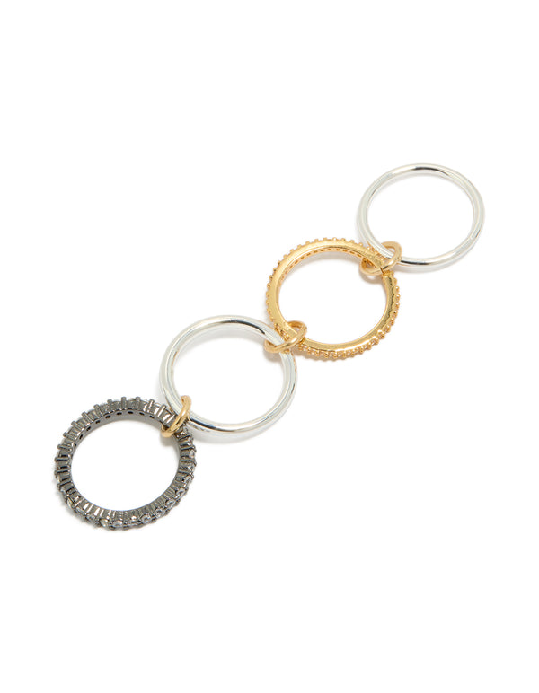 Showcasing a mixed metal plated cubic zirconia interlinked stacked ring with crystal, gold, and silver in grey and white side detail view