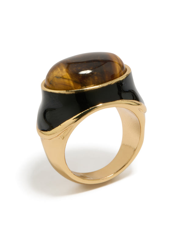 Showcasing a chunky ring in gold plated material with brown stone and black enamel front view