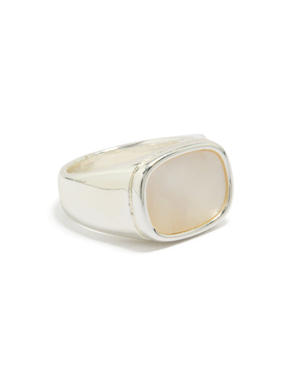 Crafted from waterproof stainless steel featuring a square shell in ivory and silver tones, designed as a chunky signet ring front view