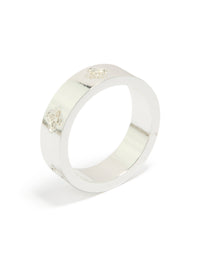 Showcasing waterproof stainless steel band ring featuring floral cubic zirconia details and dainty style in silver side detail view - link has visual effect only