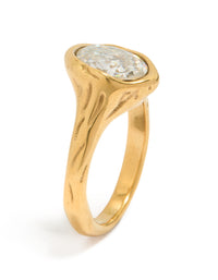 Featuring a waterproof gold plated stainless steel oval cubic zirconia molten ring with crystal and statement design front view - link has visual effect only