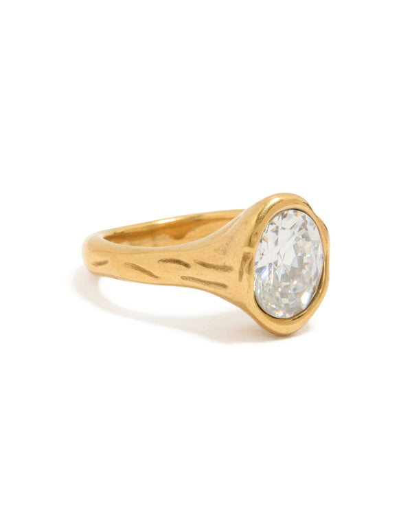 Showcasing a waterproof gold plated stainless steel oval cubic zirconia molten ring with crystal and statement design side detail view