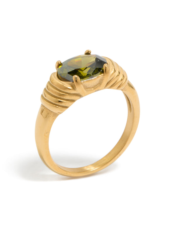 Showcasing a waterproof gold plated stainless steel ring with oval green cubic zirconia crystal in chunky style front view