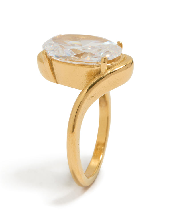 Featuring a waterproof statement ring in gold plated stainless steel with large oval cubic zirconia crystal side detail view