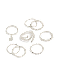 Discover a silver mixed swirl stacking rings 8-pack featuring charm and disc elements front view - link has visual effect only