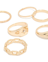 Highlighting a celestial dainty ring collection with star accents in gold close up view - link has visual effect only