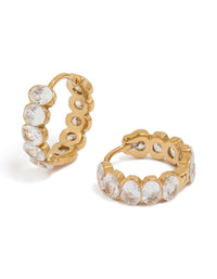 Beautifully crafted waterproof huggie earrings featuring round bezel set cubic zirconia stones in stainless steel with a gold plated finish front view - link has visual effect only