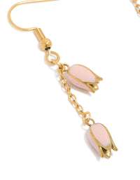 Detailed view of waterproof gold plated stainless steel pink tulips drop earrings with floral pattern close up view - link has visual effect only