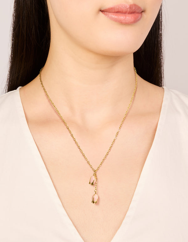 Featuring waterproof gold plated stainless steel pink tulips pendant necklace with floral in dainty style on neck view