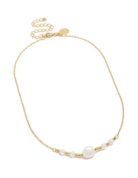 Stylish waterproof gold plated stainless steel pearls chain necklace featuring balls in statement design front view - link has visual effect only
