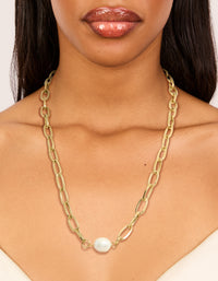 Showcasing a waterproof gold plated stainless steel paperclip pearl centre necklace with statement design on neck view - link has visual effect only