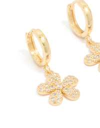 Showcasing dainty floral huggie earrings in gold plated finish featuring pave set cubic zirconia detailing close up view - link has visual effect only