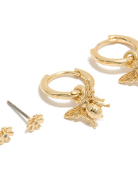Featuring gold plated micro flower studs and bumblebee huggie earrings 2-pack huggie closures close up view - link has visual effect only