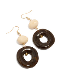 Statement drop earrings featuring chocolate, cream, and gold acrylic circles front view - link has visual effect only